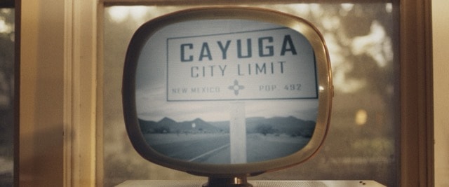 Cayuga City Limit sign displayed on a vintage television screen