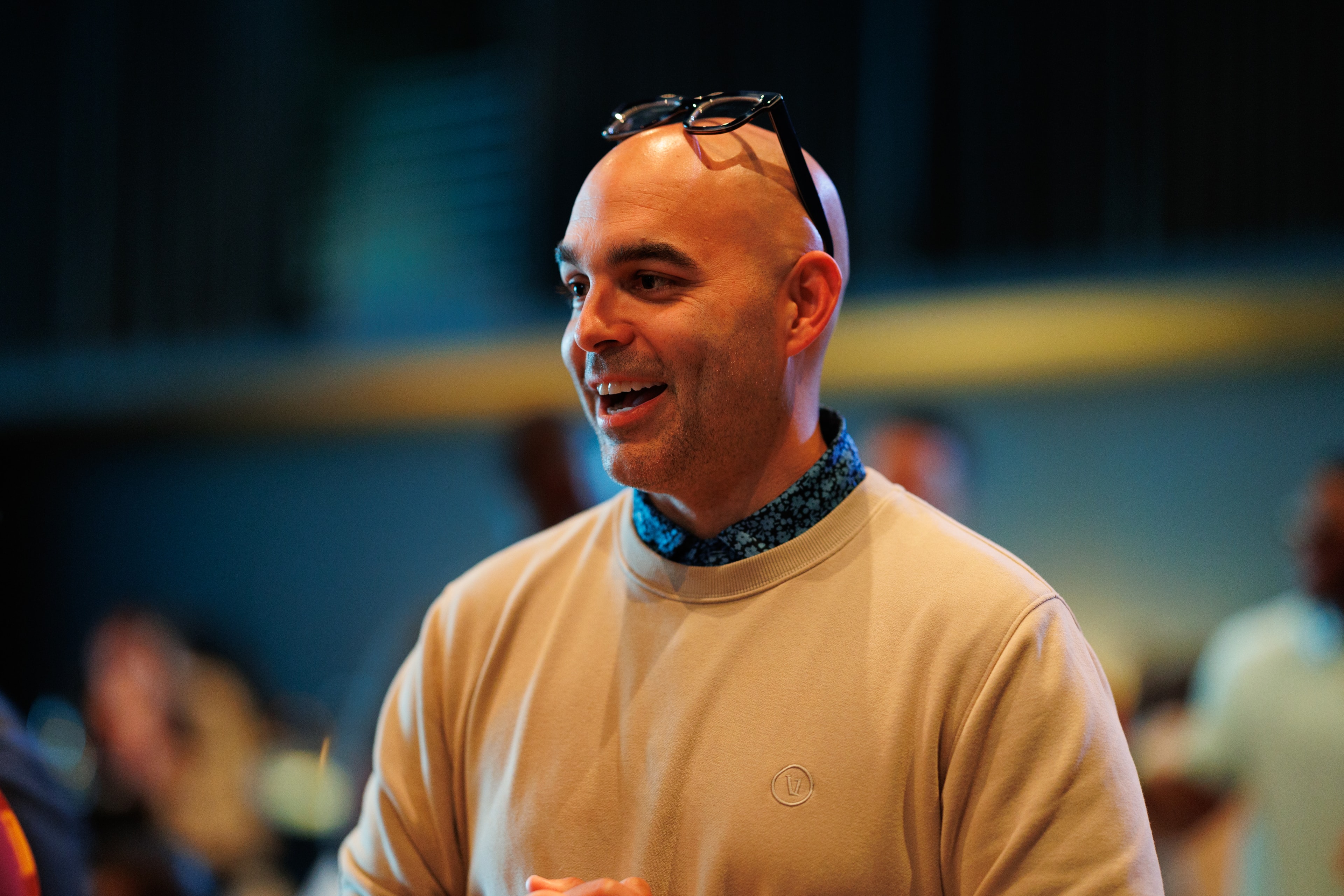 Portrait of man smiling at an event