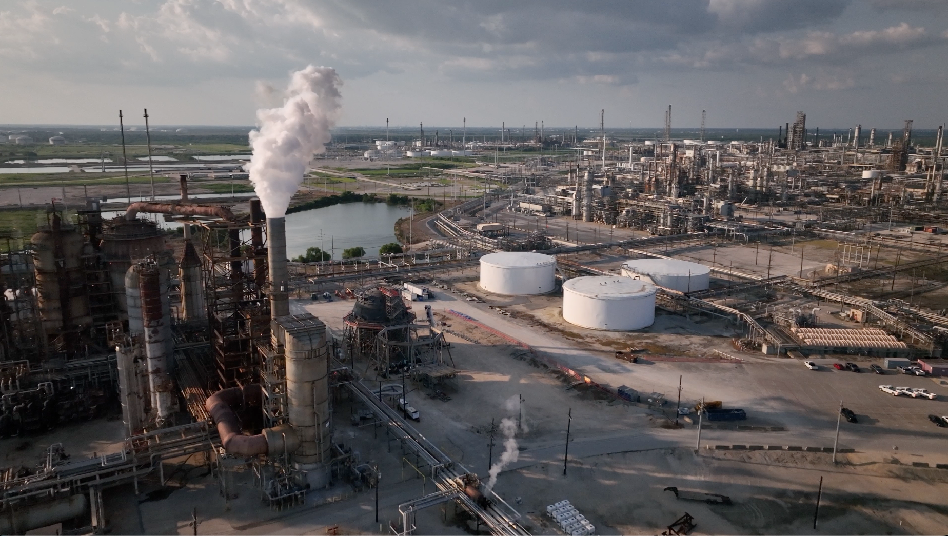 Aerial view of industrial refinery with smoke stacks
